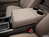  Front center console with closed lid, from driver's side looking down photo